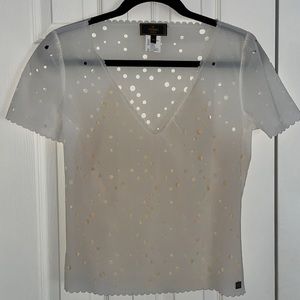 Cream colored Vintage Fendi Shirt features a nude mesh lining in the front.